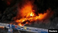 Варшава - пожар во шопинг центар, мај 2024 година. 