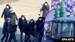 Poliția belarusă reține o femeie care a manifestat pașnic la protestele din 7 decembrie