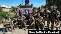 Ofițeri ai centrului de operațiuni speciale „A” al SBU (Serviciul de Securitate al Ucrainei) din orașul Kupiansk, regiunea Harkov. Fotografia a fost publicată pe 10 septembrie 2022