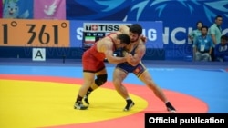 Түштүк Корея -- кыргызстандык балбан Магомед Мусаев 97 кг. салмакта финалда Иран балбаны Реза Йаздани менен күрөшүүдө. 29-сентябрь, 2014