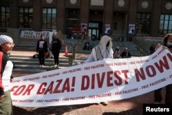 Studenții din Michigan cer „dezinvestiția”.