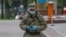 Kazakhstan. A military man walks along Almaty street, April 14, 2020