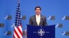 U.S. Secretary of Defense Mark Esper speaks at a news conference following a NATO defense ministers meeting at the alliance headquarters in Brussels on February 13.