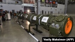 Russian Defense Ministry officials show off the 9M729 cruise missile outside Moscow on January 23.