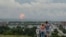 RUSSIA -- A family watches explosions at a military ammunition depot near the city of Achinsk in eastern Siberia's Krasnoyarsk region, in Achinsk, August 5, 2019