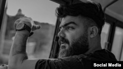 Saman Yasin was arrested at a protest in Tehran.