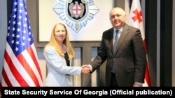 აშშ-ის ყოფილი ელჩი კელი დეგნანი და სუსის ხელმძღვანელი გრიგოლ ლილუაშვილი
