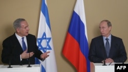 ولادیمیر پوتین، رئیس جمهور روسیه (سمت راست) و بنیامین نتانیاهو، نخست‌وزیر اسرائیل