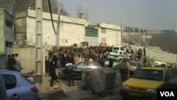 A photo of a 2009 incident in which inmates' relatives gathered outside Evin prison in Tehran.
