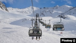 Ski lifts on an Austrian ski slope.