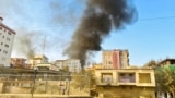 Smoke rises up from the site of explosions in Kabul on October 15.