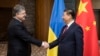 Кытай лидери Си Цзинпин жана Украина президенти Петро Порошенко. 