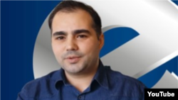 Турецкий журналист Рагип Камиль Ильбей