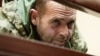 Ukrainian sailor Yuriy Budzylo, who was detained by Russia off the Crimean coast, appears at a court hearing at Simferopol's Kyievsky District Court on November 27.