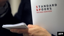 Зниження рейтингу не викликало катастрофи на світових ринках