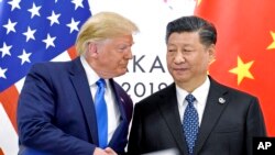 Președintele american Donald Trump și omologul său chinez, Xi Jinping.