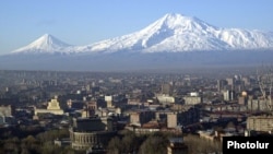 The snow-covered peak of Mount Ararat, which lies in modern-day Turkey, looms over the Armenian capital, Yerevan. (file photo)