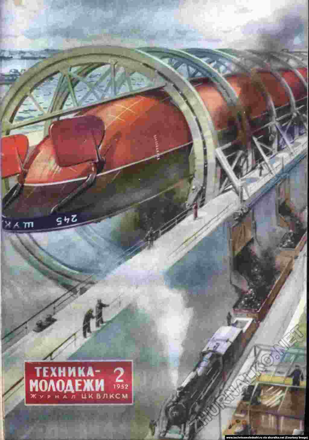 Descărcarea cărbunelui dintr-o maşină uriaşă şi încărcarea lui în vagoane.