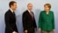 Эммануэль Макрон, Владимир Путин и Ангела Меркель перед началом переговоров в Гамбурге, лето 2017 года