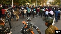 The vote in parliament came as angry protests against the bill intensified in India's northeastern regions bordering Bangladesh, with police clashing with demonstrators in Assam state.