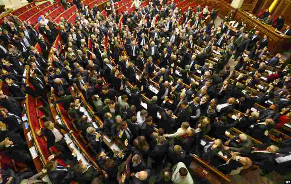 The Ukrainian parliament votes for antiprotest laws, which themselves sparked a fresh wave of protests on January 16, 2014.&nbsp;
