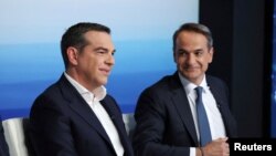 Izbori su donijeli neočekivano visok rezultat za konzervativnu Novu demokratiju grčkog premijera Kirjakosa Micotakisa (desno) i jako loš rezultat ljevičarske Sirize, Aleksisa Ciprasa (na slici levo).