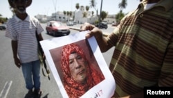 Ливия: разыскивается Муамар Каддафи.