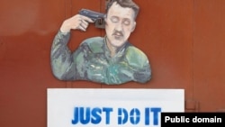 Карикатура художника Сергія Захарова на російського полковника Ігоря Гіркіна (Стрєлкова), який на той час був так званим «міністром оборони» угруповання «ДНР». Донецьк, серпень 2014 року