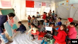 Sirijska deca u školi, Liban, 2015.