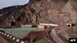 The dam sits on the Vakhsh River.