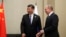 ШЫҰ саммитіне қатысуға келген Қытай төрағасы Си Цзиньпин (сол жақта) және Ресей президенті Владимир Путин. Астана, 8 маусым 2017 жыл. 