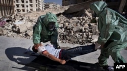 Волонтери проводять тренування, як правильно потрібно реагувати у разі хімічної атаки, Алеппо, 15 вересня 2013 року