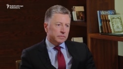 U.S. Envoy Calls On Putin To Change His 'Aggressor' Image