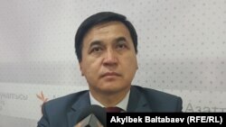 Каныбек Иманалиев.