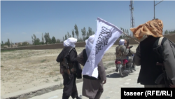 FILE: Taliban fighters in a ruler region of Afghanistan's Ghazni Province.