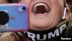 Az elnök támogatója egy kampányeseményen 2020. szeptember 10. REUTERS/Jonathan Ernst