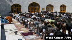 Worshippers offer Friday prayers on the first day of the Muslim holy month of Ramadan at Pul-e Khishti mosque in Kabul on April 24.