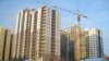 Строящийся жилой комплекс на улице имени Шокана Уалиханова в Астане. 5 февраля 2013 года. 
