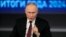 Russian President Vladimir Putin gesticulates during a Q&A session in Moscow on December 19. 