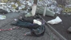 Тіла загиблих, які принесли до барикади на вул. Інститутській