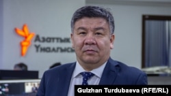 Алмамбет Шыкмаматов.