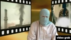 Képernyőkép egy tádzsik fegyveresről egy Afganisztánban működő militáns csoport által közzétett videóból