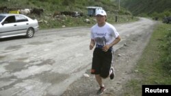 Айсулуу Тыныбекова Лондон Олимпиадасында даярданып жаткан учуру. 16-май, 2012-жыл.