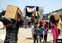 صدها هزار نفر از مردم عراق در پی سقوط موصل و نینوا، آواره شدند