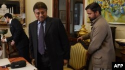 Pakistan - In this photograph taken on December 29, 2013, Pakistan's former military ruler Pervez Musharraf leaves after addressing foreign media representatives at his farmhouse in Islamabad. Musharraf failed to show up for a hearing in the treason case.