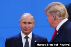 Володимир Путін та Дональд Трамп під час саміту «Групи двадцяти» у Буенос-Айресі, 30 листопада 2018 року