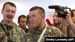 Російські бойовики Стрєлков і Моторола в окупованому Донецьку. Червень 2014 року