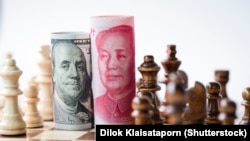 Доллар жана юань. Иллюстрациялык сүрөт.