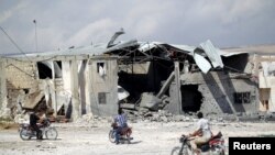 Активисттер орус учактарынын бомбасы тийди деген жай. Идлиб, 7-октябрь, 2015-жыл.