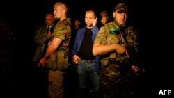 Александр Бородай, гражданин России, в то время один из главарей группировки «ДНР», которая в Украине признана террористической. Оккупированный Донецк, 17 июля 2014 года